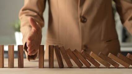 Crisis Management Assessment Business Risk Planning with Wooden Domino Effect Economic Environment 4K Stock Video Financial Risk Control