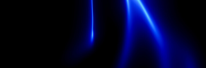 Abstract blue light on black background.