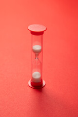 Elegant hourglass filled with white sand. Time