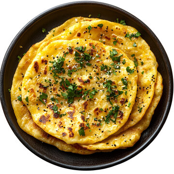 Top view of an extremely perfect looking akki rotti in a dark clay plate isolated on a white transparent background