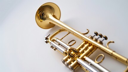 Obraz premium Gleaming Gold Trumpet: A Symphony of Brass and Light
