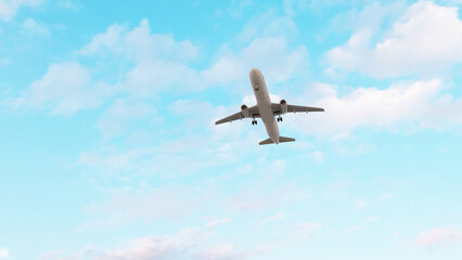 ULTRA HD. Airplane flies in blue sky. Travel, tourism. Airplane takes off against the background of blue sky.  
