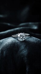 A captivating close-up of a diamond engagement ring elegantly placed on soft black satin fabric. The shiny gemstone and the luxurious backdrop exude sophistication and romance.. AI Generation