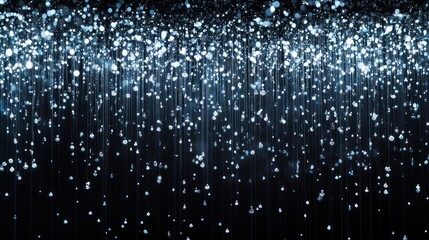 Obraz premium A shimmering backdrop of blue and silver particles resembling falling light or rain.