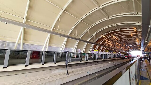 Light Rail Transit or LRT or rail transport system in Indonesia, modern metro train stationed at an urban platform, showcasing efficient public transport