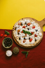White Pizza (Pizza Bianca) with Cherry Tomatoes and Olives.