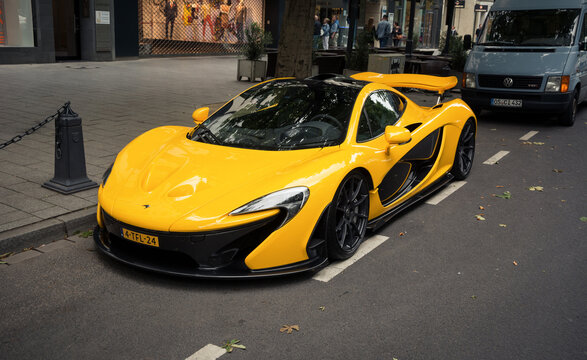 McLaren P1 parked on the street. Yellow british hypercar on the street in Dusseldorf, Germany on June 19 2014.