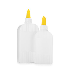 Bottles of glue with caps isolated on white