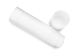 One glue stick and cap isolated on white, top view