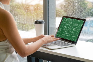 Mathematic equations and modish formula on computer screen showing concept of science and education