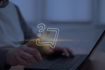 Hand interacting with a glowing question mark chat icon on a virtual interface, symbolizing inquiry, support, problem-solving, and digital communication in modern technological environments.