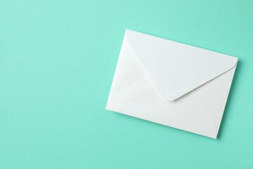 Paper envelope on color background. Empty greeting card for text design