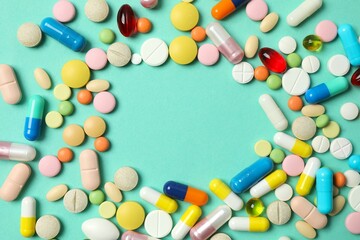 Various pills on color background