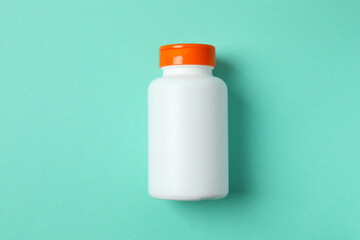White bottle on color background