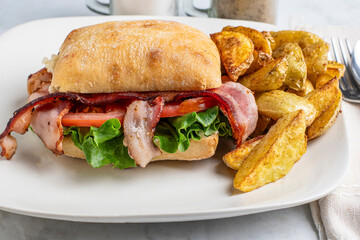 ciabatta blt sandwiches with potato wedges,