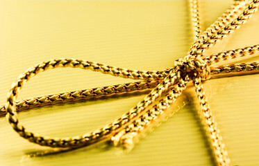 Gift bow in coloured light