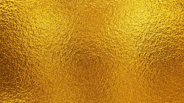 gold foil texture 4k video. luxury gradient golden leaf chirstmas new year spring festival background footage