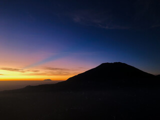 Silhouette of a Mountain at Dawn.  The Beauty of Twilight Color