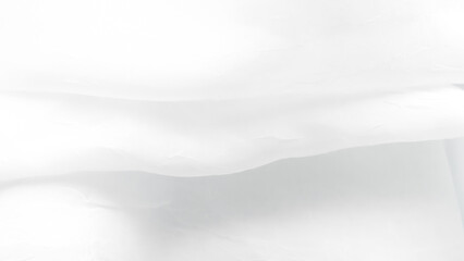 Obraz premium Delicate white tulle veil background with soft folds and elegant texture