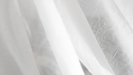 Obraz premium Romantic white veil background with airy layers and soft elegant textures.