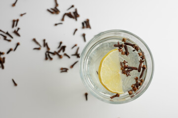 Infused Water with Clove and Lemon for Health Benefits