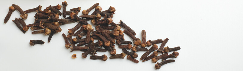 Aromatic Clove Spice on White Surface