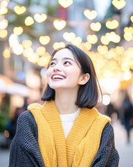 Obraz premium Joyful smile in heart-shaped lights urban street portrait evening close-up happiness