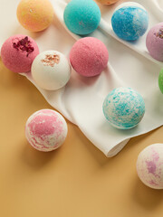 handmade colored bath bombs in a minimalistic composition