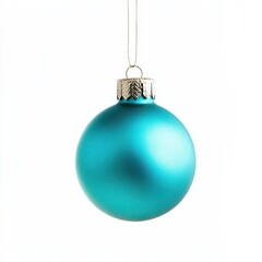 Turquoise Christmas ornament hangs on a thread, against an isolated white background