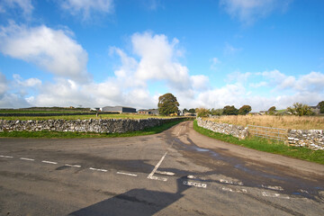 Road junction on a country lane in Wetton, Staffordshire, UK