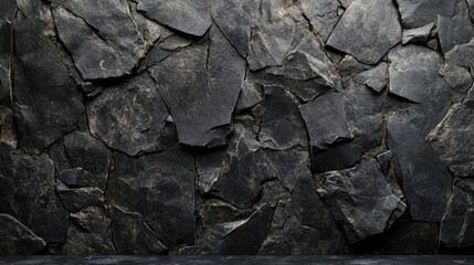 Black concrete stone wall creates a striking backdrop in a home bedroom setting. This black background enhances the aesthetics, offering a modern touch with ample copy space.