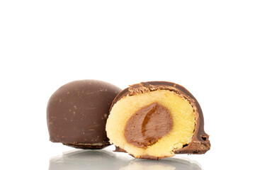 Several chocolate candies, close-up, isolated on a white background.