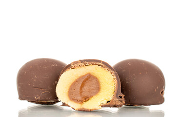 Several chocolate candies, close-up, isolated on a white background.