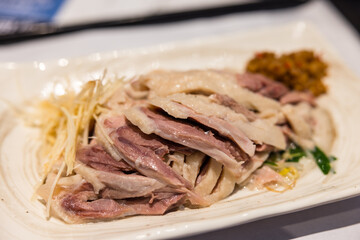 Traditional sliced goose dish served on plate
