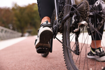 Man with bicycle outdoors, closeup. Healthy lifestyle