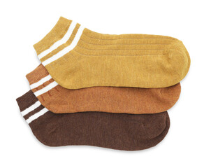 Pairs of soft socks isolated on white, top view