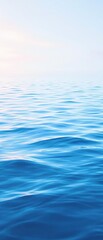 Soft focus blue watercolor painting of a serene ocean with gentle undulations and ripples , serene landscape., wavy lines, soothing colors, natural waves