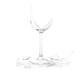 Pieces of broken wine glass isolated on white