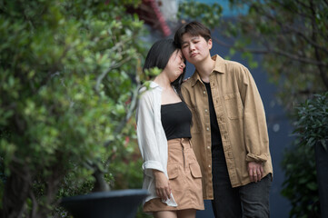 Happy Asian lesbian lgbtq couple dating in love