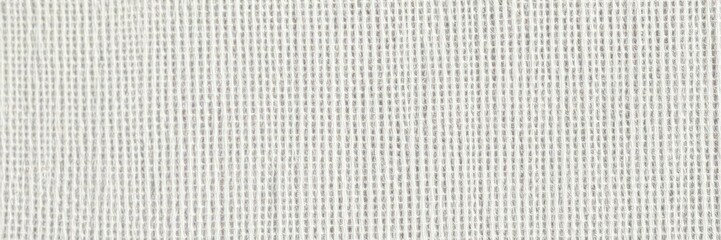 Fototapeta premium Close-up of coarse, off-white canvas texture with visible weave, texture overlay, cream