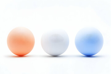 Three pastel spheres on white background, studio shot, product display, website mockup.