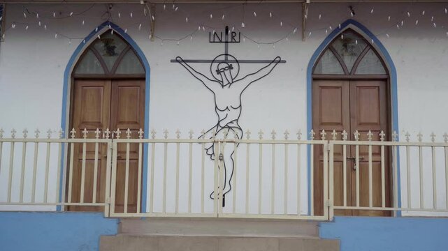 Sectarian church. Crucifix on the building.