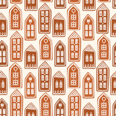 Seamless pattern with gingerbread houses. Vector Christmas background. 