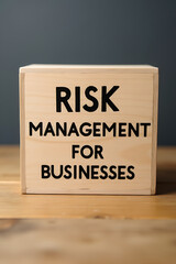 Obraz premium Risk management concepts for businesses are written on a wooden box in a simple yet effective way to convey important information._00001_