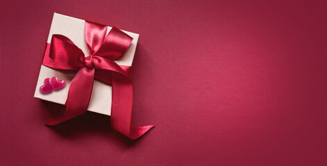 White paper box isolated on red background, valentines day, copy space for text