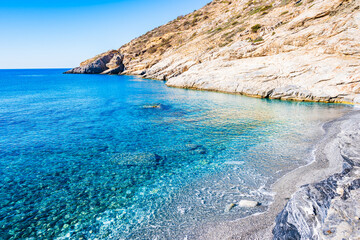 View of Mouros bay and beach with crystal clear azure sea water, Amorgos island, Cyclades, Greece