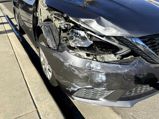 Damaged front fender of a car after a crash