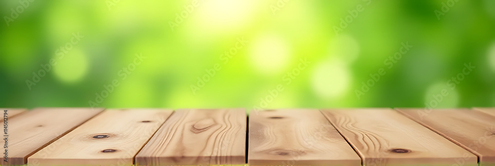 Poster a wood table top features a blurred, fresh green bokeh from a garden background for product display 