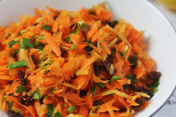A bowl with traditional Polish carrot salad © nastyakamysheva