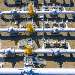 Natural gas pipeline in European Union. High pressure pipes on a hot summer day.